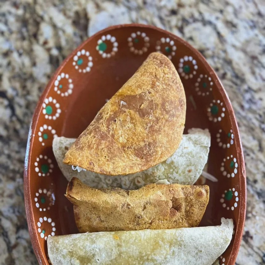 Quesadillas made with Bendito Comal tortillas in a clay dish